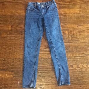 Blue jeans with stylish spots and two buttons